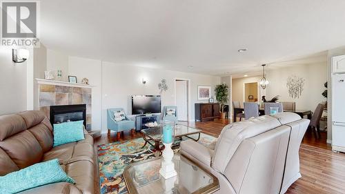 12300 Pinehurst Place Unit# 2, Osoyoos, BC - Indoor Photo Showing Living Room With Fireplace