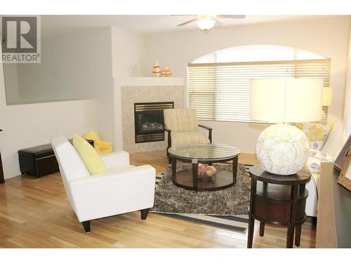 849 Winnipeg Street Unit# 104, Penticton, BC - Indoor Photo Showing Living Room With Fireplace