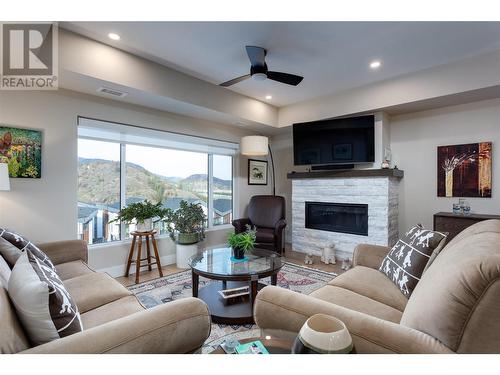 2161 Upper Sundance Drive Unit# 9, West Kelowna, BC - Indoor Photo Showing Living Room With Fireplace