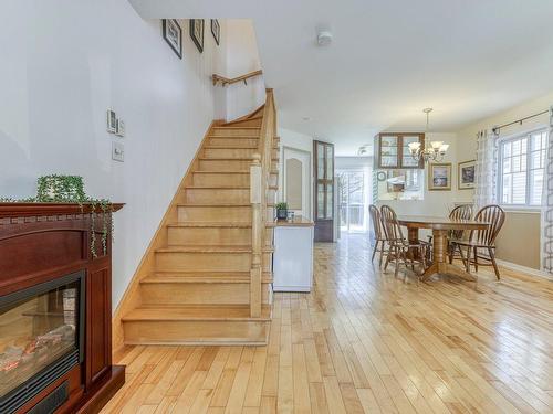 Staircase - 159 Rue Cornellier, Repentigny (Le Gardeur), QC - Indoor With Fireplace