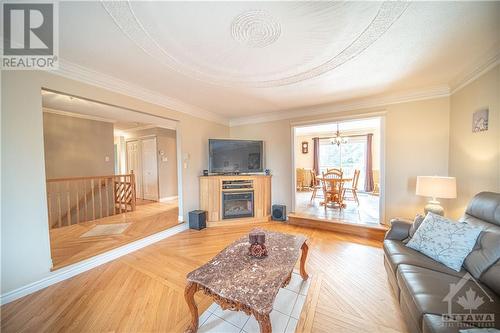 1296 Ste Marie Road, Embrun, ON - Indoor Photo Showing Living Room With Fireplace
