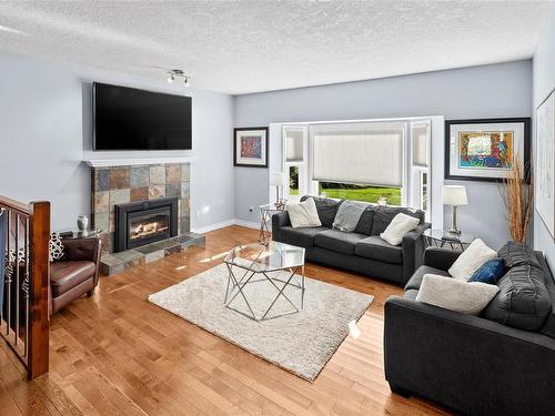 1640 Dean Park Rd, North Saanich, BC - Indoor Photo Showing Living Room With Fireplace