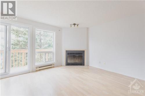 300 Briston Private, Ottawa, ON - Indoor Photo Showing Living Room With Fireplace