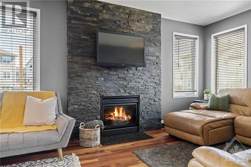 218 Hillpark High Street, Ottawa, ON - Indoor Photo Showing Living Room With Fireplace