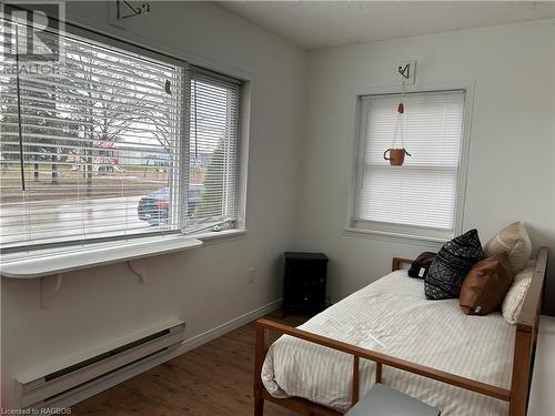 Main level unit 2 Sunroom - 430 Parkside Drive, Mount Forest, ON - Indoor Photo Showing Bedroom