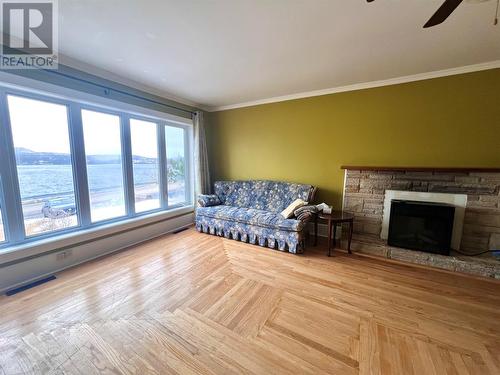 255 Main Road, Sunnyside, NL - Indoor Photo Showing Living Room With Fireplace