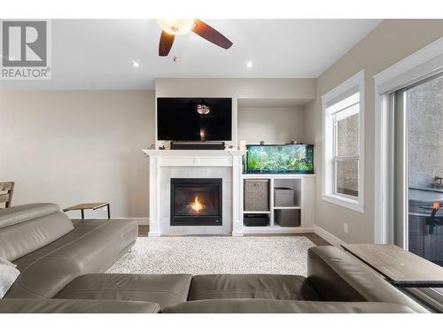 3359 Cougar Road Unit# 28, West Kelowna, BC - Indoor Photo Showing Living Room With Fireplace