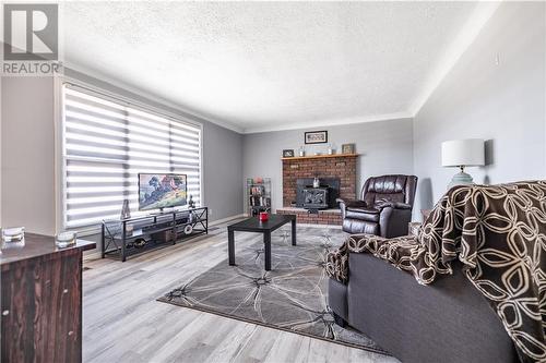 154 Walters Road, Pembroke, ON - Indoor Photo Showing Living Room With Fireplace