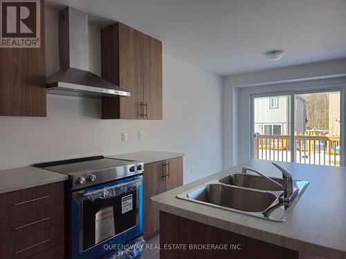 65 Alaskan Hts, Barrie, ON - Indoor Photo Showing Kitchen With Double Sink