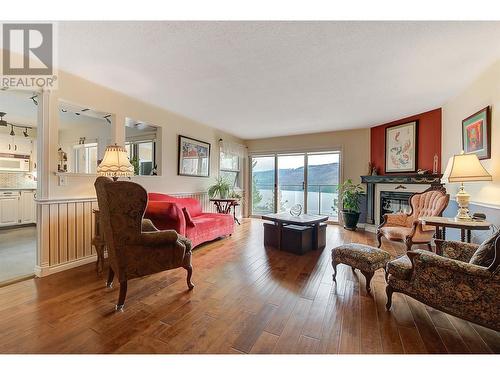 4450 Ponderosa Drive Unit# 104, Peachland, BC - Indoor Photo Showing Living Room With Fireplace