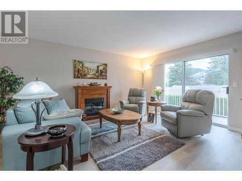 14615 Victoria Road N Unit# 3, Summerland, BC - Indoor Photo Showing Living Room With Fireplace