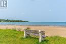 Gobles Grove Beach offers miles of sandy shoreline, where you can relax and unwind amidst the calming sounds of the waves. - 3 George Street, Saugeen Shores, ON  - Outdoor With Body Of Water With View 