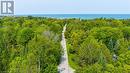 A straight shot down George Street to the warm, shallow waters and white sand shoreline. - 3 George Street, Saugeen Shores, ON  - Outdoor With Body Of Water With View 