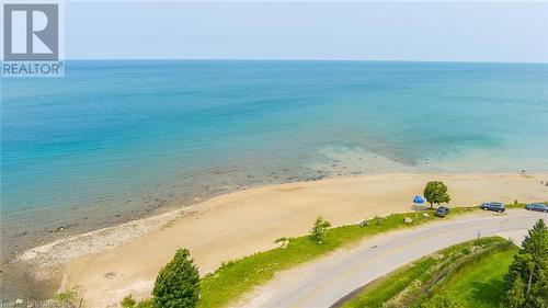 Parking along the street for Gobles Grove Beach, if you're toting your beach umbrella and chairs. - 3 George Street, Saugeen Shores, ON - Outdoor With Body Of Water With View