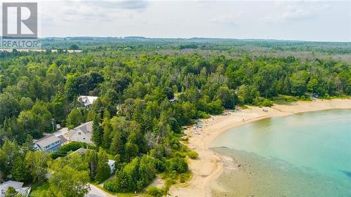 Miles of sandy shoreline at Gobles Grove Beach. - 3 George Street, Saugeen Shores, ON - Outdoor With Body Of Water With View