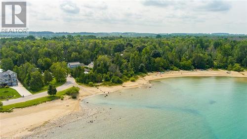 Watch world-class sunsets from your spot in the sand at Gobles Grove Beach. - 3 George Street, Saugeen Shores, ON - Outdoor With Body Of Water With View