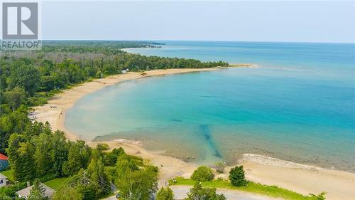 The turqouise blue water of Gobles Grove Beach rivals the Caribbean. - 3 George Street, Saugeen Shores, ON - Outdoor With Body Of Water With View