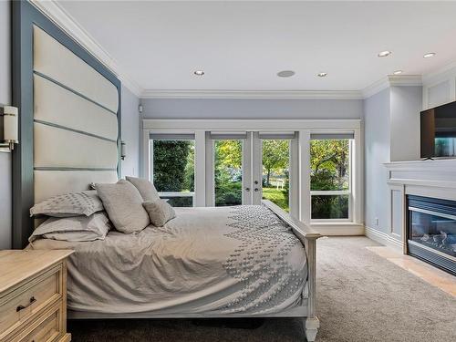 2050 Troon Crt, Langford, BC - Indoor Photo Showing Bedroom With Fireplace