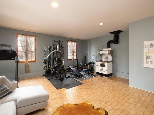 Family room - 639 Rue Du Tisseur, Pointe-Fortune, QC - Indoor Photo Showing Gym Room