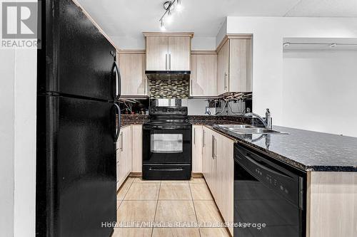 #8M -8 Rosebank Dr, Toronto, ON - Indoor Photo Showing Kitchen With Double Sink