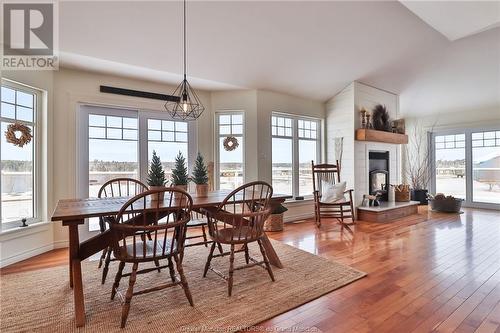 8 Island View Lane, Main River, NB - Indoor Photo Showing Dining Room With Fireplace