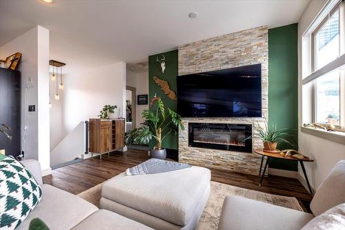 2221 Black Hawk Drive, Sparwood, BC - Indoor Photo Showing Living Room With Fireplace