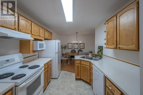 298 Yorkton Avenue Unit# 303, Penticton, BC - Indoor Photo Showing Kitchen With Double Sink