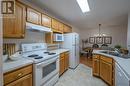 298 Yorkton Avenue Unit# 303, Penticton, BC  - Indoor Photo Showing Kitchen With Double Sink 