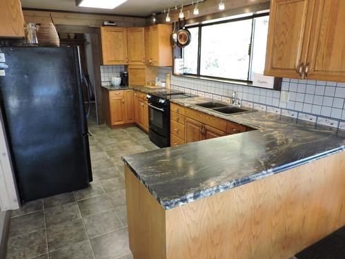 12590 Highway 3, Greenwood, BC - Indoor Photo Showing Kitchen With Double Sink