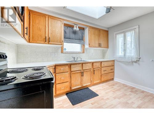 676 Ellis Street, Penticton, BC - Indoor Photo Showing Kitchen With Double Sink