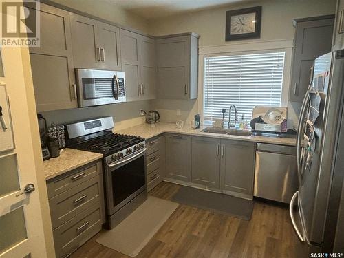 1619 Prince Of Wales Avenue, Saskatoon, SK - Indoor Photo Showing Kitchen With Stainless Steel Kitchen With Double Sink