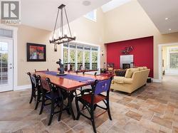 Open concept dining area with walkout to the deck - 