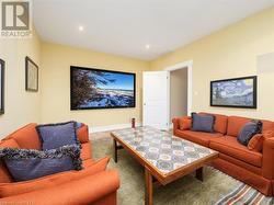 Your very own home theatre room with built-in speakers, projector and screen! - 