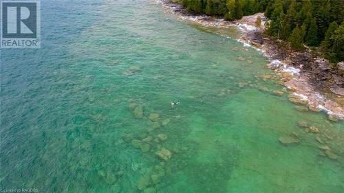 A private 1.9 Acre property tucked in the trees on a dead-end road. - 90 Greenough Point Road, Northern Bruce Peninsula, ON - Outdoor With Body Of Water With View