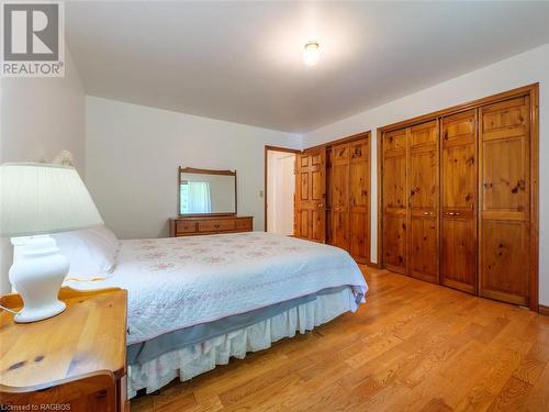 Beautiful hardwood floors and double closets in the Primary Bedroom - 35 Avele Road, South Bruce Peninsula, ON - Indoor Photo Showing Bedroom