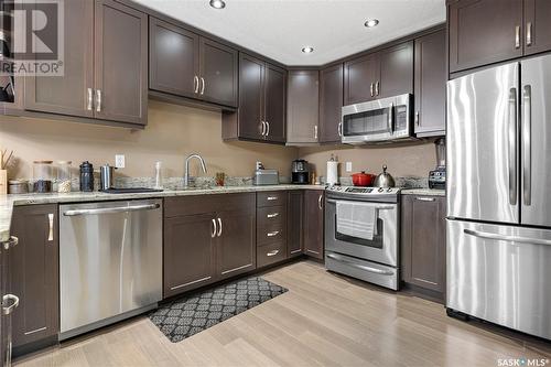 203 2300 Broad Street, Regina, SK - Indoor Photo Showing Kitchen With Stainless Steel Kitchen