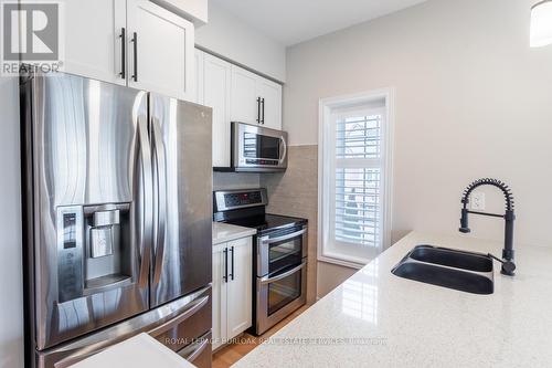 #57 -515 Winston Rd, Grimsby, ON - Indoor Photo Showing Kitchen With Double Sink With Upgraded Kitchen