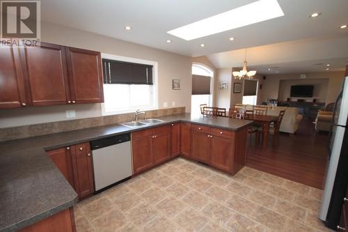 6109 Saint Martin Place, Oliver, BC - Indoor Photo Showing Kitchen With Double Sink