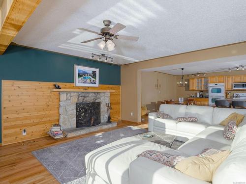 8682 Stirling Arm Dr, Port Alberni, BC - Indoor Photo Showing Living Room With Fireplace