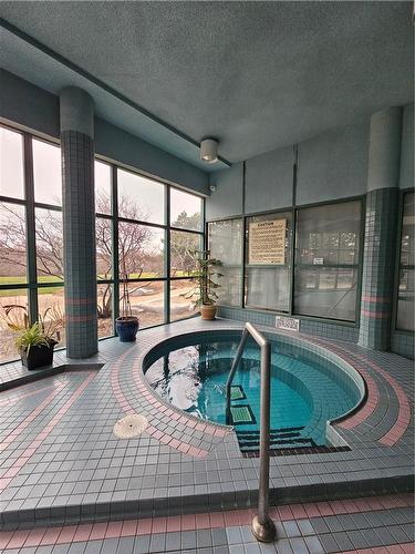 4460 Tucana Court|Unit #403, Mississauga, ON - Indoor Photo Showing Other Room With In Ground Pool
