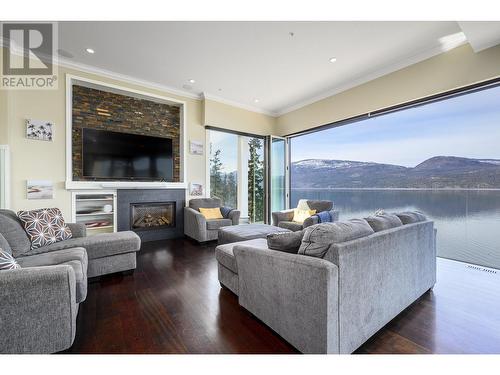 9605 Eastside Road, Vernon, BC - Indoor Photo Showing Living Room With Fireplace