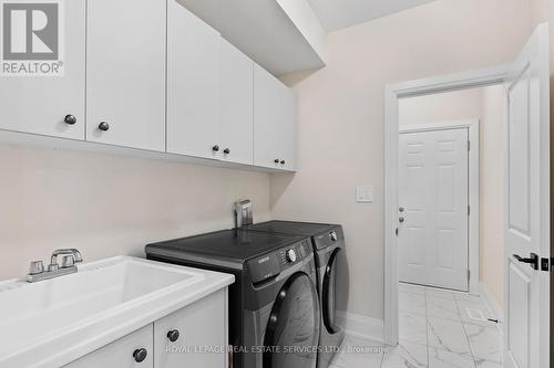 28 Thompson Way, Springwater, ON - Indoor Photo Showing Laundry Room