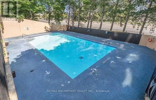 908 - 5 Lisa Street, Brampton, ON - Outdoor With In Ground Pool With Backyard