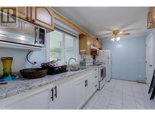 2508-2510 Sexsmith Road, Kelowna, BC - Indoor Photo Showing Kitchen With Double Sink