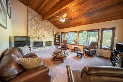 9394 Moyie Shores Estates Road, Moyie, BC - Indoor Photo Showing Living Room With Fireplace
