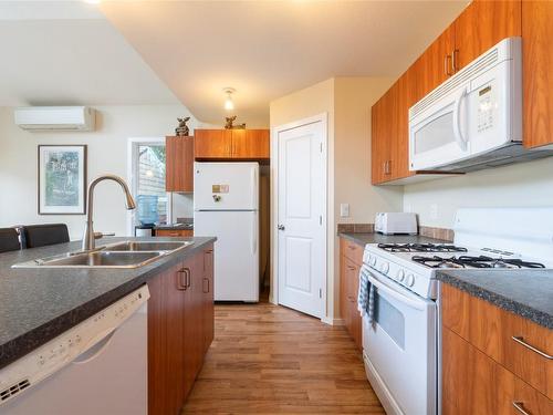 3-6300 Armstrong Road, Eagle Bay, BC - Indoor Photo Showing Kitchen With Double Sink