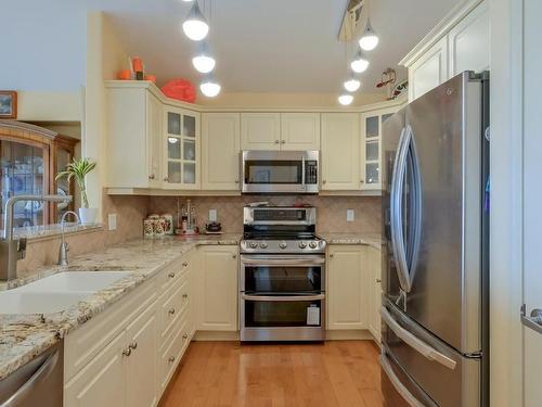 5261 Sandhills Drive, Kelowna, BC - Indoor Photo Showing Kitchen With Double Sink