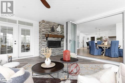 1224 Golden Beach Road, Bracebridge, ON - Indoor Photo Showing Living Room With Fireplace