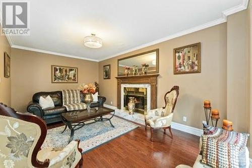 160 Sai Crescent, Ottawa, ON - Indoor Photo Showing Living Room With Fireplace