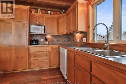 23 Power St, Grande-Digue, NB - Indoor Photo Showing Kitchen With Double Sink